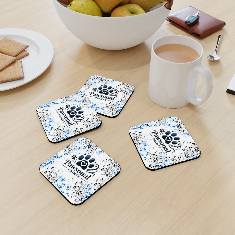 Set of four square personalised coasters with vivid pet photo prints and glossy finish on a wooden table