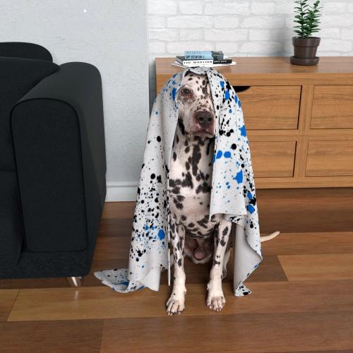 "Adorable dog with a personalised pet blanket draped over its head, showcasing soft fabric and custom design.