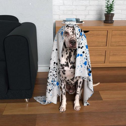 "Adorable dog with a personalised pet blanket draped over its head, showcasing soft fabric and custom design.